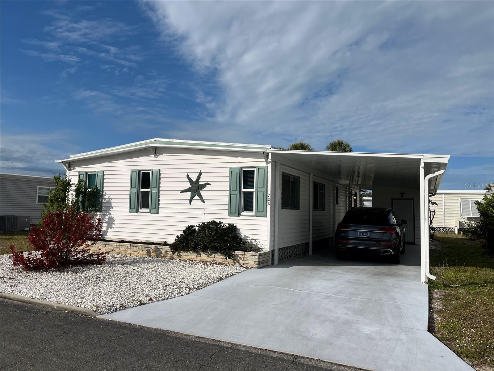 Wow what a price for this home with a view of the lake from the Florida room, membrane roof over, New carport, circular kitchen, laminate flooring throughout. Fully turnkey furnished.
Venice Isle is the premier resident owned over 55 Mobile home Park in Venice. There are close to 1000 homes with the most active residents. There is always something going on for you to do. We have many Park gatherings and first rate shows on site. The Park has every amenity you can imagine. Come take a walk through both of our 2 clubhouses and make yourself at home. The Park has 2 tennis courts, a fitness center, 2 heated pools, 2 hot tubs, saunas, putting greens, shuffleboard, Bocce ball, miniature golf, art rooms, pool room, TV lounges, card rooms, library, horseshoes, ceramic kilns, 2 huge ballrooms, Sunday services and much more!