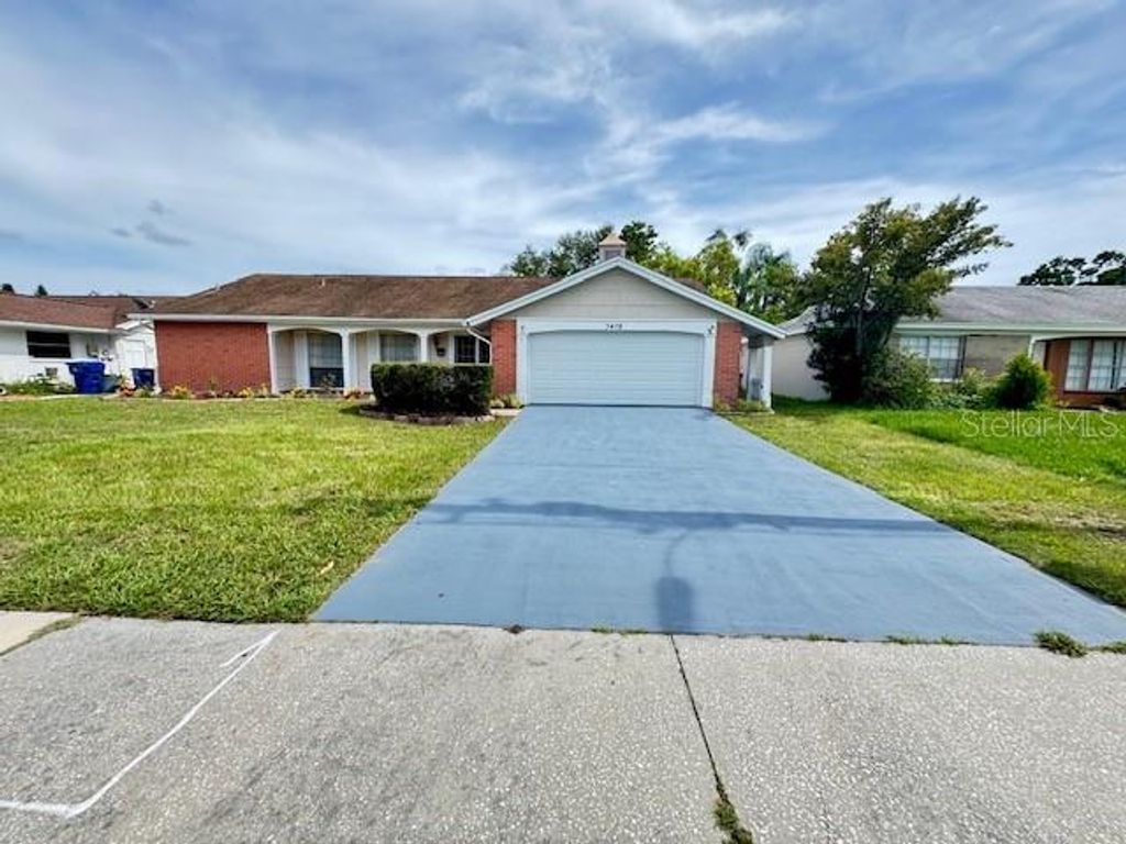 Photo of 3438 Moog Road, Holiday, FL 34691 (MLS # TB8528276)