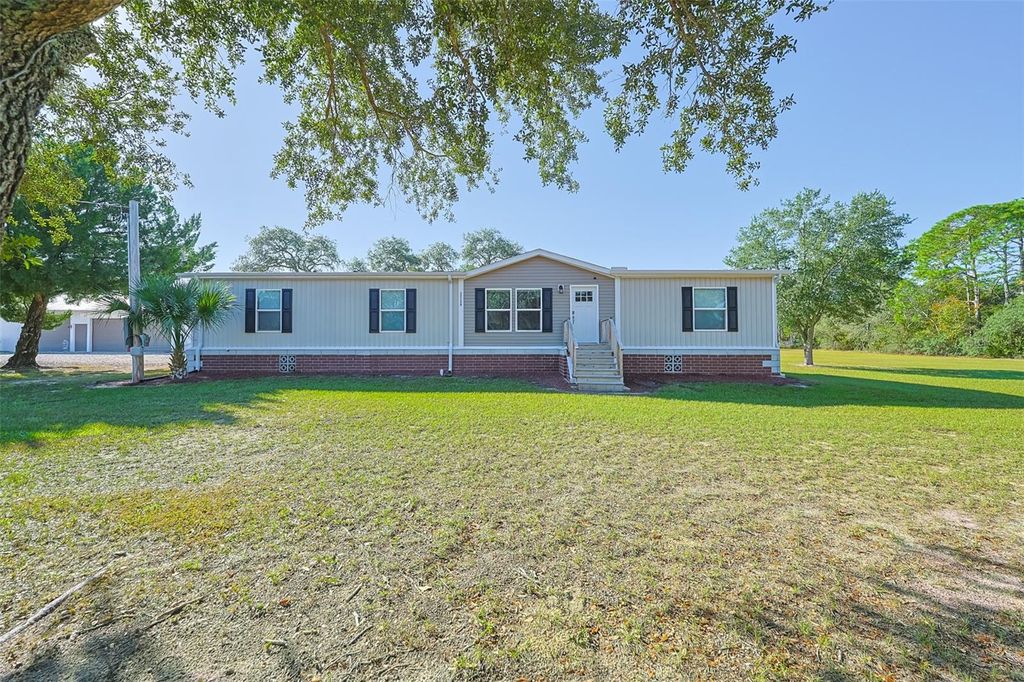 Photo of 12124 Redrose Avenue, Weeki Wachee, FL 34614 (MLS # TB8440278)