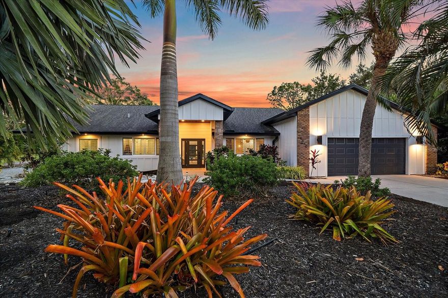 Welcome to your Sarasota Sanctuary! Fully remodeled, custom-built home in the heart of Longwood Run, just minutes from UTC, beaches and the airport. This spacious, 3 bed plus den, 2 bath home sits on over half an acre. The open, split floor plan has a modern and crisp feel with numerous upgrades throughout. Streamlined, custom kitchen is fresh and modern with white oak cabinetry, quartz countertops, neutral backsplash and Bosch appliances. The adjacent, vaulted great room is open to the kitchen and features a wood-burning fireplace with stone surround, as well as tasteful, LVP flooring throughout the entire home. Enjoy total privacy right in-town with mature trees and lush landscaping backing up to thick woods with no one behind you! Here you will find an outdoor oasis with south-facing pool, and large firepit area with plenty of room for sports, gardening, or future landscaping projects. The massive lanai area with travertine pavers boasts over 500 square feet of covered living space making it perfect for entertaining and simply enjoying nature under a rich, mahogany shiplap ceiling. Over 1,200 square feet of enclosed lanai space with plenty of room for lounging and additional dining area. This spectacular view can be enjoyed from several different areas of the home with impact sliders off the primary bedroom, formal living, and kitchen/great room area. There is nothing left to do here but call this home your own!  Brand-new, Pex plumbing throughout (2025) with transferrable lifetime warranty, impact windows/sliders throughout with transferrable lifetime warranty (2025), modern Board and Batten James Hardie siding with fresh paint (2025) with transferrable lifetime warranty, newer lanai enclosure (2018), refinished pool surface (2018), well for irrigation (2019), roof (2017), hot water heater (2023), HVAC (2018/2019). This property is not your typical, cookie-cutter, production home. The design enthusiast will appreciate all the tasteful, high-end updates throughout as well as a fantastic floor plan that's not easily found in an established neighborhood in this area. Schedule your private showing today!