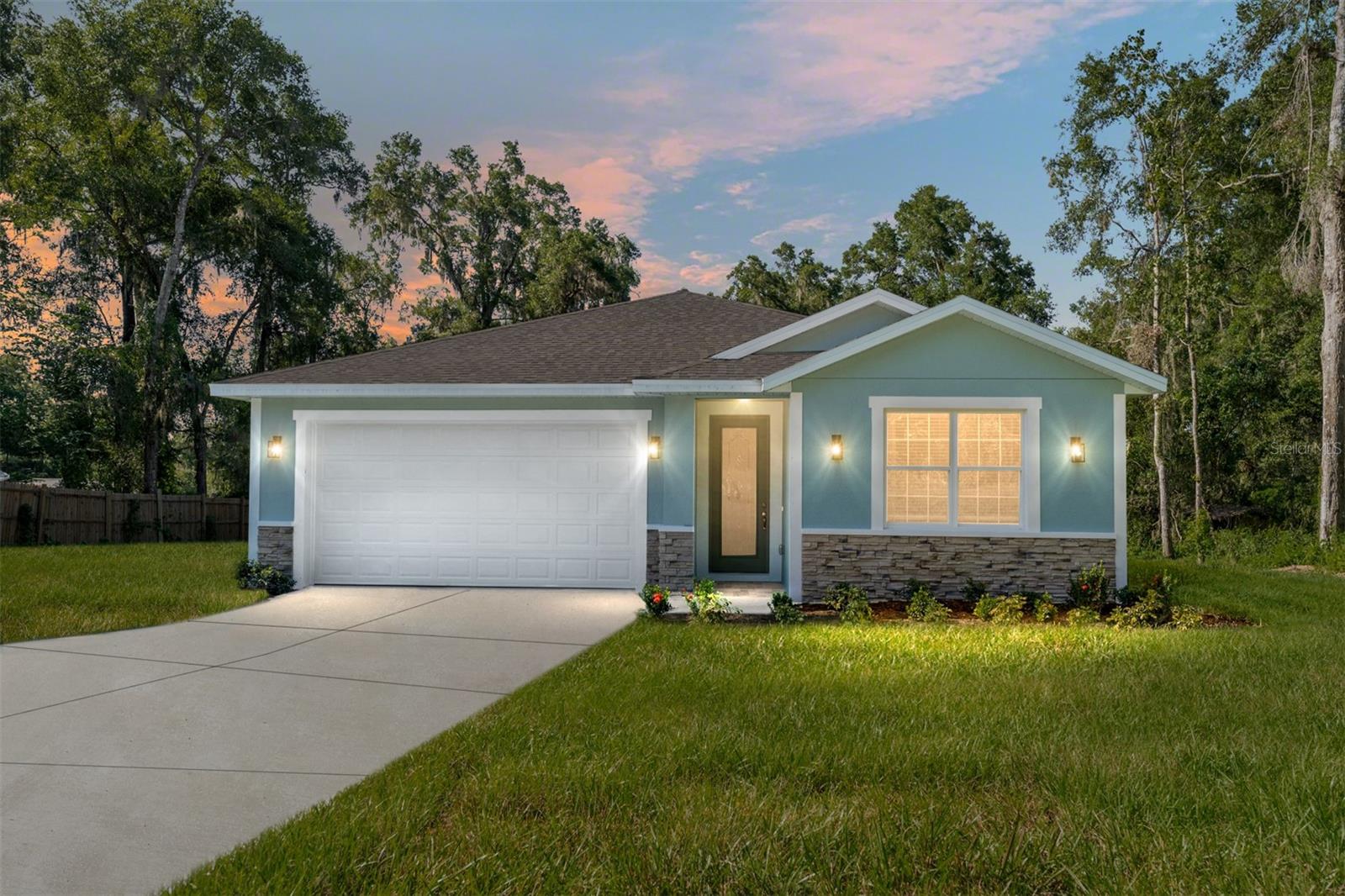 Welcome to this brand new home in Belleview Heights Estates offering over 2,000 sq ft of thoughtfully designed living. With 4 bedrooms and 3 full baths including two private primary suites, this plan is ideal for multigenerational living, long-term guests, or a spacious home office setup. Inside, you’ll find 9’ ceilings with crown molding throughout, durable ceramic tile in all main areas, and a bright, open concept great room. The kitchen impresses with stainless steel appliances, granite countertops, and ample cabinetry that flows seamlessly to the dining and living spaces. All bathrooms feature granite vanities for a cohesive, elevated finish.
Set on a quiet street, this address keeps you close to daily conveniences in Belleview and south Ocala. Commuters will love the access approximately 5–8 minutes to US-301/441, about 10 minutes to I-75 via SR-484, ~20 minutes to The Villages, ~25 minutes to Downtown Ocala, and roughly 1 hour 15 minutes to Downtown Orlando (traffic dependent). Outdoor recreation abounds with Lake Weir and Carney Island Conservation & Recreation Area nearby. With space to grow, modern finishes, and a versatile two-suite layout, this new construction checks all the boxes schedule your private tour today.