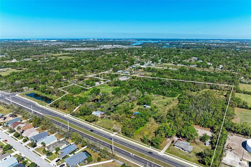 4.5 up to 20 acres on 44th Ave and 45th St. All three properties connect. This would allow for entrance from 45th St and 44 Ave. 44th is a 4 lane throughfare from Cortez to Lakewood Ranch.