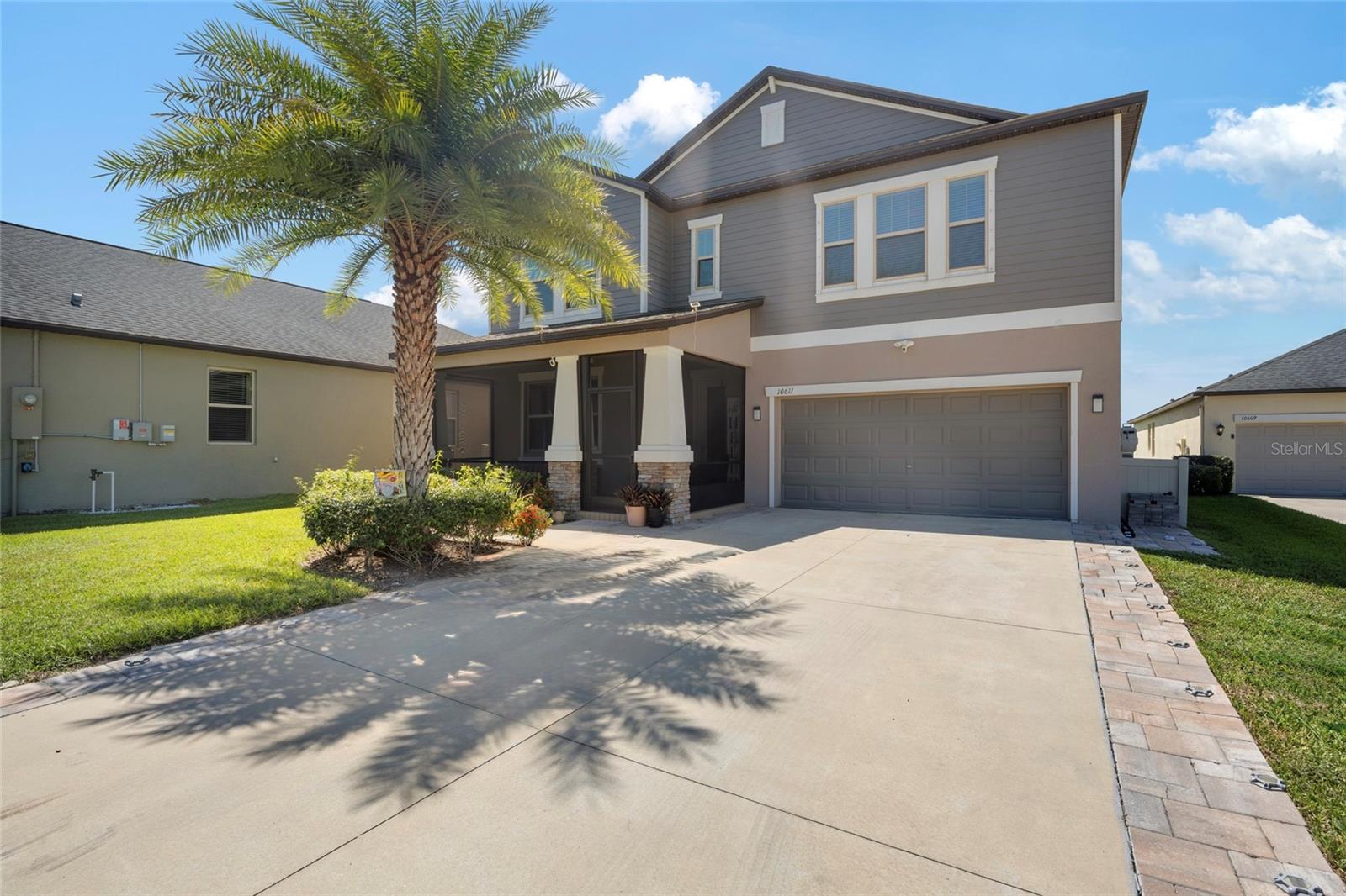 Waterfront Luxury Living in Shady Creek! Spacious 5-Bed, 3.5-Bath, 3-Car Garage, Plus Media Room!
Welcome to your dream home! This elegant 3,854 sq. ft. Virginia floor plan is set on a premium waterfront lot in the highly sought-after Oaks at Shady Creek Phase 2. Offering 5-7 bedrooms, 3.5 bathrooms, 3 car tandem garage, this residence blends style, comfort, and smart living.
• Waterfront Backyard Oasis: Enjoy peaceful mornings and stunning sunsets from your custom extended, fully screened lanai, ideal for both relaxation and entertaining.
• Gourmet Chef’s Kitchen: under sink reverse osmosis system, 42” cabinets, granite countertops, large center island, stainless steel appliances, and walk-in pantry.
• Primary Retreat on the First Floor: Spacious suite with tray ceiling, luxurious spa-style bathroom, and an oversized customized walk-in closet—with its own laundry area nearby for ultimate convenience.
• Entertainment Spaces Galore: Upstairs features a huge dedicated movie theater with custom platforms, plus four secondary bedrooms each with walk-in closets, and a second laundry room for added ease.
• Energy-Efficient & Upgraded: 15 SEER high-efficiency A/C system, tankless water heater, ceramic tile flooring in main areas and baths, ceiling fans, upgraded landscaping package, and 2019 solar panels for lower utility costs. Exterior Jellyfish lighting system, Attic flooring installed for additional storage, Under-stair storage accessible through garage, Dining room conversion to bedroom/flex space, Custom movie theatre room with tiered platforms, Reverse osmosis system under kitchen sink, Mini-split A/C unit in garage, 50-amp electrical panel for EVs or RVs, Dedicated generator switch for peace of mind, Govee lighting along driveway & front patio, Smart home system (Alexa or Google) controlling lights, doors, garage and AC. Does Not Convey: All washers & dryers, kitchen refrigerator, and garage freezer
• Community Perks: Resort-style amenities include a huge swimming pool, fitness center, basketball court, playground, and more—all with low HOA fees that include lawn maintenance!
• Prime Location: Just minutes from I-75, you’ll have quick access to shopping, dining, downtown Tampa, and the sandy Gulf beaches. Top-rated schools nearby. You should live here! Come see your new home!