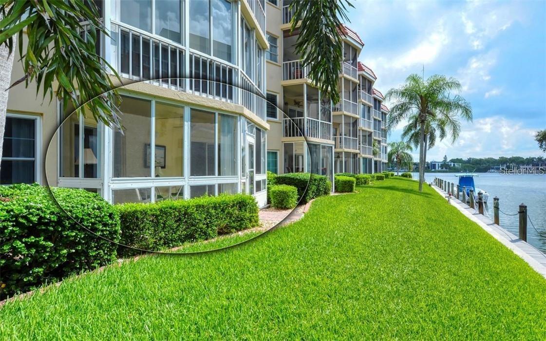 YOUR BOAT STEPS AWAY! PARADISE AWAITS YOU! FIRST FLOOR WALKOUT! ALL WALLS DOWN! MODERN NEW OPEN FLOOR PLAN WITH EXQUISTE FINISHES! Gorgeous Renovated Condo with a Canal FRONTAGE Intracoastal Waterway View on Siesta Key. THIS STUNNING CONDO WAS TOTALLY RENOVATED BEFORE THE STORM FROM THE WALLS OUT! ALL NEW PLUMBING AND NEW STACKS HAVE BEEN REPLACED! THE ELECTICAL AND PLUMBING EVEN UNDER THE FLOORS ARE BRAND NEW! DECORATED WITH DESIGNER STYLE FOR HERSELF! SOLD AS YOU SEE IT! Hurricane Impact Windows, including sliders in lanai! Tankless Hot Water Heater, never worry about water leakage or replacement, easy worry free hot water!All NEW Appliances! Work from home on your walk-out lanai or watch the deep water boats on the Intracoastal Waterway while sipping your coffee watching the sunrise. Incredible View of the Intracoastal Waterway, Beautiful two bedroom, two bath spacious first floor walk-out condo with lots of natural light. Completely remodeled and fully renovated in March 2023! One month minimum rental, Fifty-five+ community. Crescent Arms BEACH access to Siesta Key Beach directly across the street, the Number One Beach in the Country! Heated Outdoor Pool and Spa, Sauna, Modern Clubhouse, Activities all Season, Patio Seating Area on the canal and our own Siesta Harbor Fishing Pier. Boat slips available by applying to the office. The trolley stop is at the entrance of the complex. Walk to restaurants and bars, easy on and off the key! You Deserve Paradise! Easy Carefree Living just move in stunning finishes, This is your Paradise!
