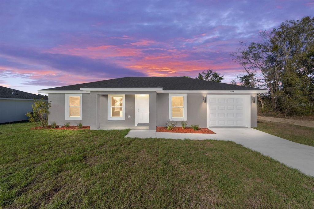 Photo of 15328 SW 26th Place, Ocala, FL 34481 (MLS # OM716414)