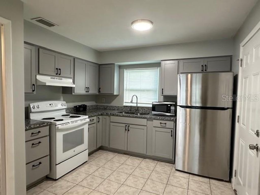 Photo of 10405 N Jasmine Avenue #A, Tampa, FL 33612 (MLS # TB8458733)