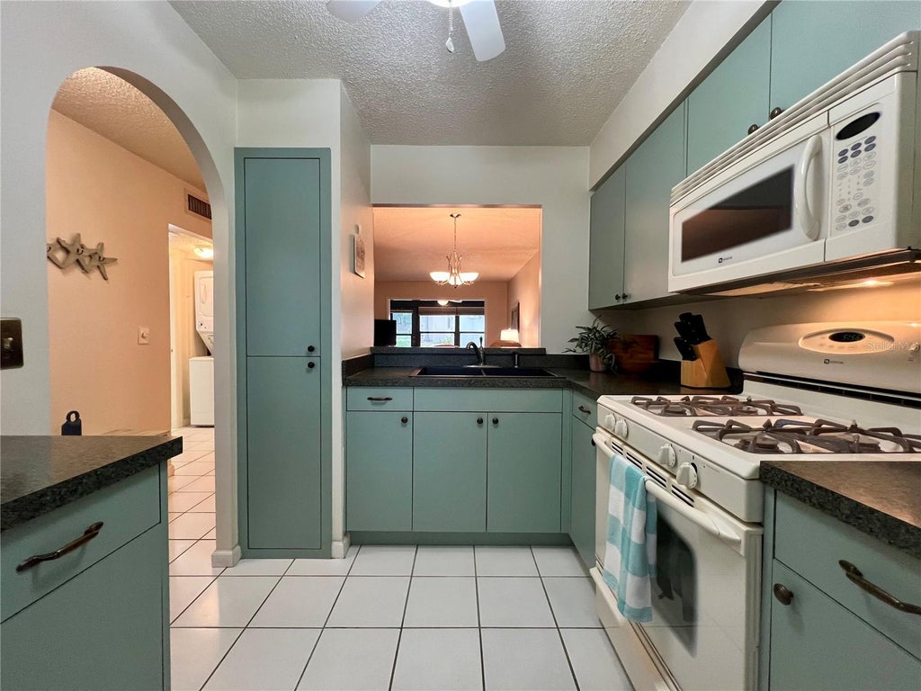 Photo of 1286 Mission Hills Boulevard, Clearwater, FL 33759 (MLS # TB8554128)