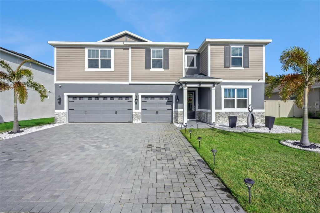 Photo of 887 Asterfield Lane, Deland, FL 32720 (MLS # O6375245)