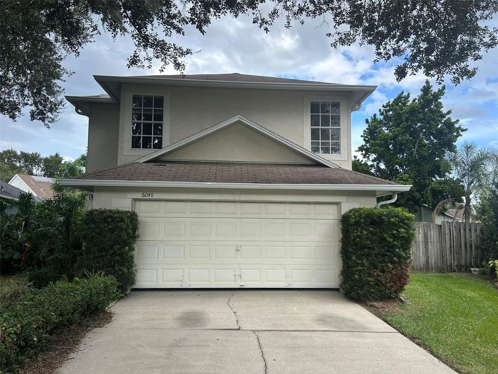 Photo of 6048 Sand Key Lane, Wesley Chapel, FL 33545 (MLS # A4668174)