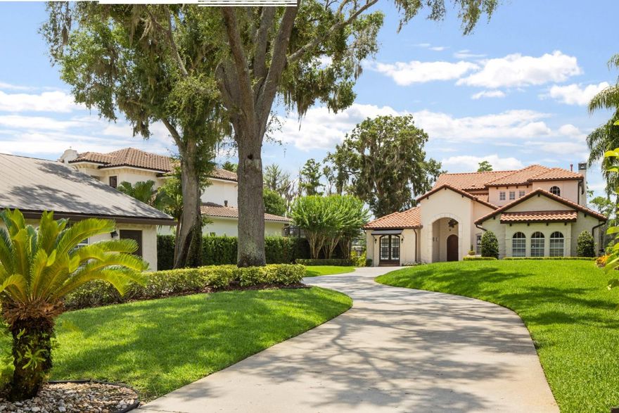 Under contract with contingencies and Backup Offers will be reviewed. Welcome to luxury on Lake Butler Blvd with stunning Wauseon Bay views. This estate spans nearly an acre of landscaped grounds, ideal for relaxation and entertainment. The property features a secondary oversized, air-conditioned garage that could be converted into a guest suite. The main home is a custom-built residence with high ceilings, new wood flooring and expansive lake-view windows. The first-floor primary suite offers a private sitting area and spa-like bath, with an additional bedroom suite on the second floor and two additional guest rooms with access to the hall bathroom. Ideal for entertaining, the formal dining room flows between formal living room and gourmet kitchen. The renovated kitchen is open to both the family room and a perfectly placed breakfast nook with views of the sparkling pool.  Rounding out the features of the interior, this home offers first floor laundry room, mid floor storage room and second floor loft with balcony. Outdoors, enjoy a travertine lanai, pool deck, private beach and spacious dock with a sitting room and boat lift. Located in Downtown Windermere, this is tranquility on the Butler Chain of Lakes.