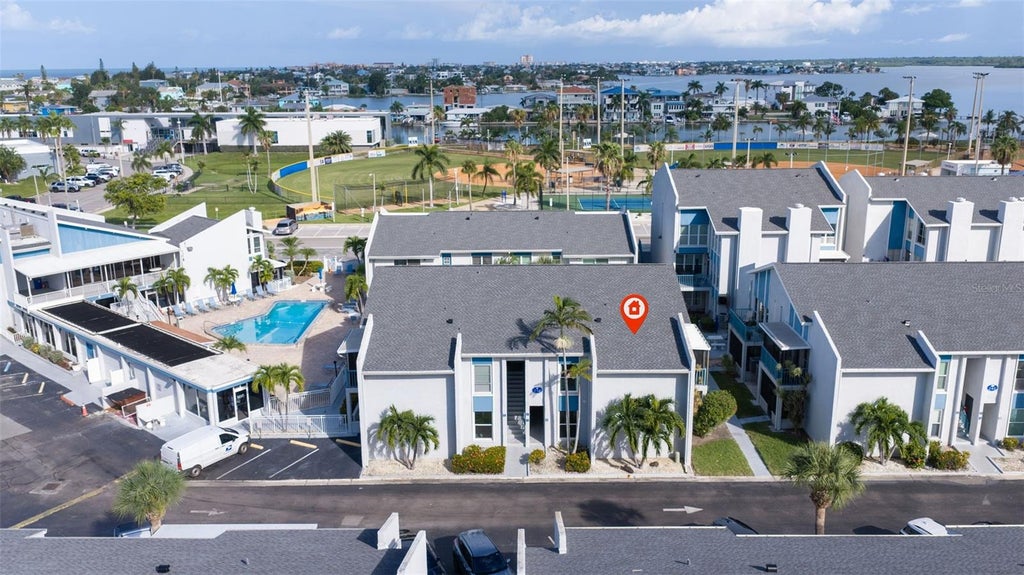 Photo of 230 Medallion Boulevard #F, Madeira Beach, FL 33708 (MLS # TB8545530)
