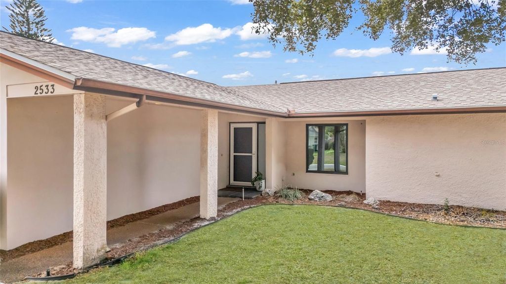 Photo of 2533 Bramblewood Drive W, Clearwater, FL 33763 (MLS # TB8461095)