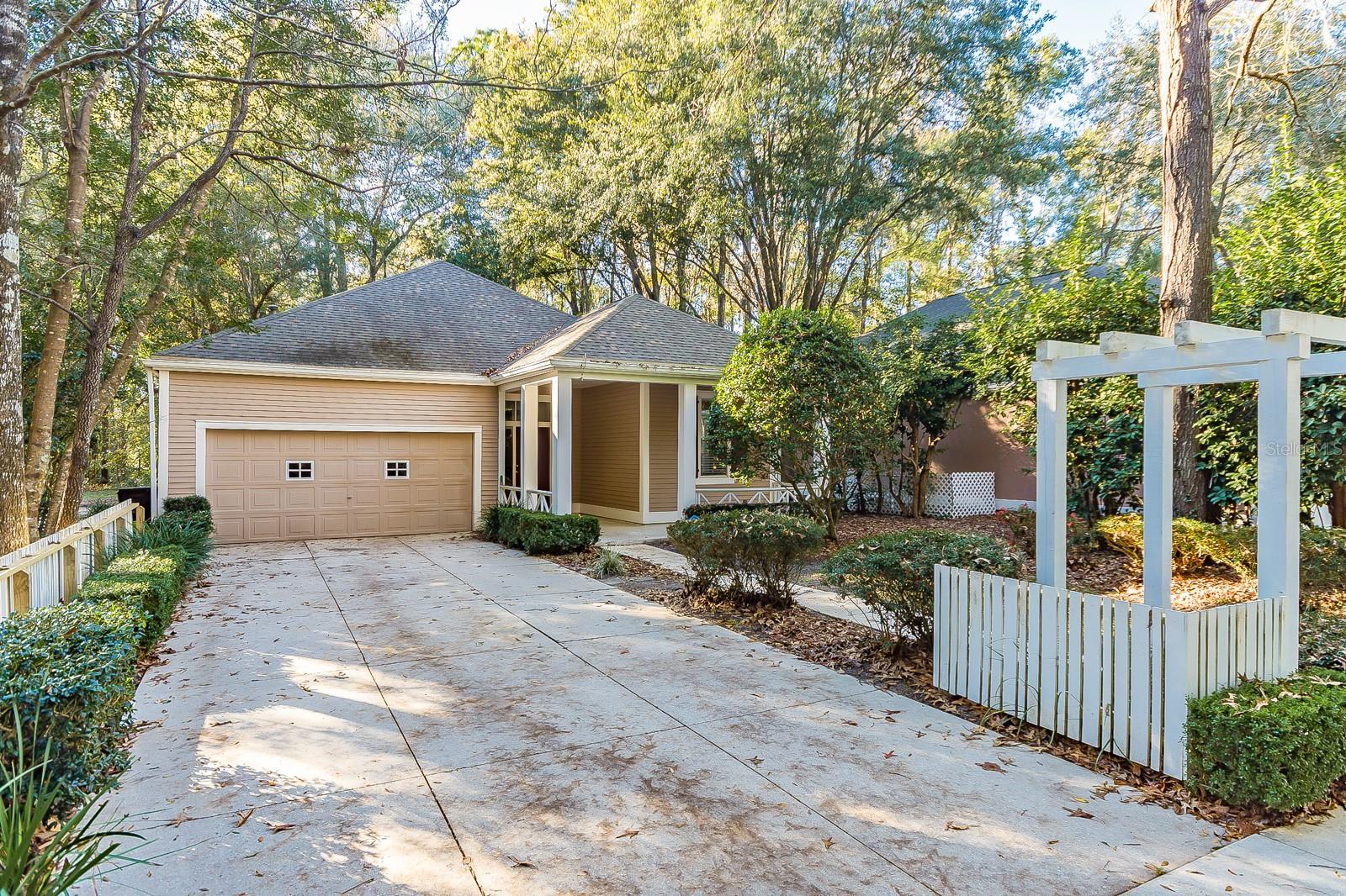 Enjoy living in Haile Plantation Golf and Country Club with miles of walking trails in Hickory Walk. This 3 BR 2 BA features a large living room area, kitchen/ dining room combo, picket fence, screened lanai, wooded privacy, and a wonderful Golf Course view. Located a short distance to Haile Village with shops, restaurants, offices, Saturday''s Farmer''s Market, Holiday Festivals, and more. Close to UF, UF Health @ Shands, VA, I-75, Butler Plaza, Celebration Pointe and more.