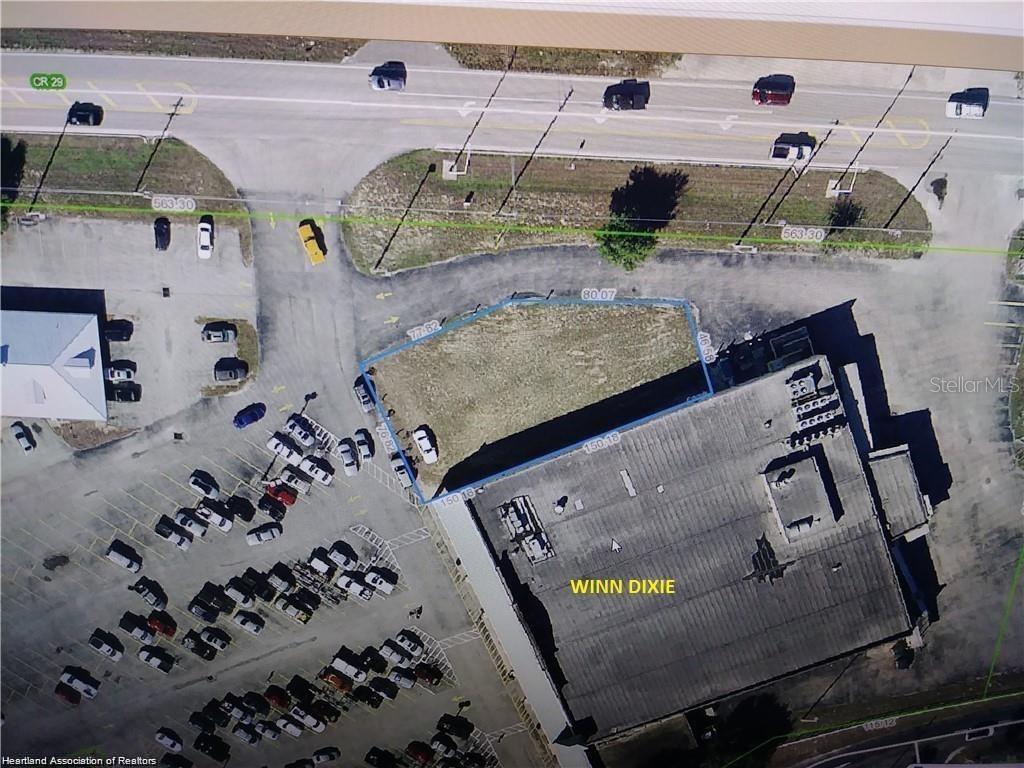Prime Retail Outparcel Adjacent to Winn Dixie Lake Placid, FL.! One of three remaining Out Parcels at the Winn Dixie Shopping Plaza in Lake Placid. 180Ft of Hwy Frontage off CR 29 and US 27. Great visibility with high Traffic flow. Zoned B-3 Commercial adjacent to the Winn Dixie Building. Ideal for Commercial Multi-use Development. Use corner for high exposure professional/retail. Lots of Upside Profit Potential. Land Lease Available. Here! Don't miss out call today
