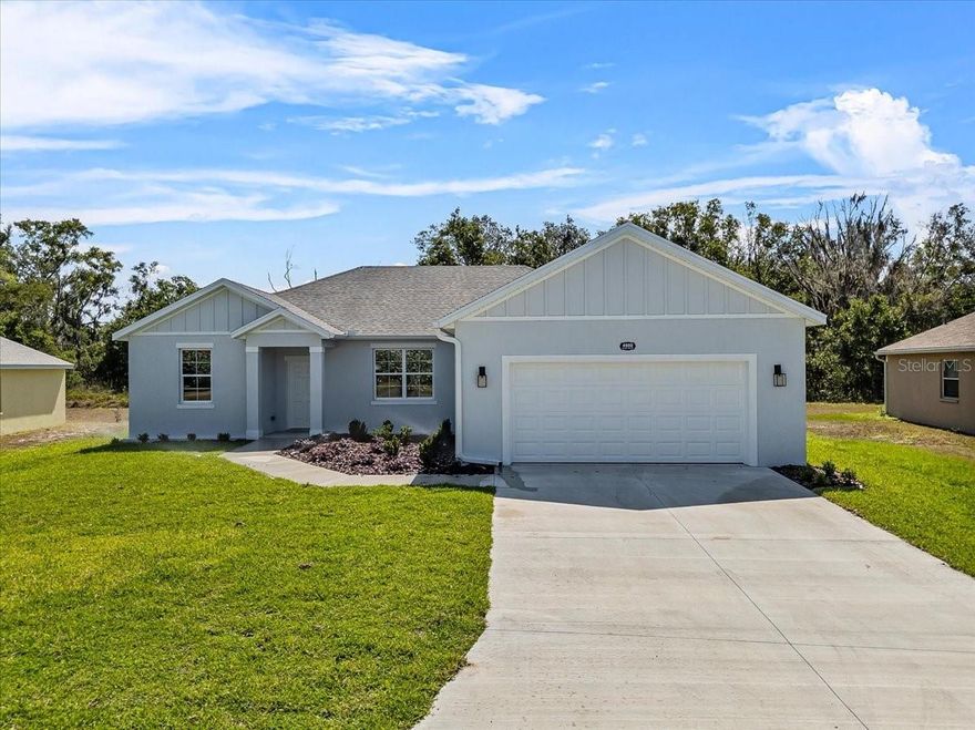 **Builder is offering a $10,000 credit to buy down your interest rate or put towards closing costs! Welcome to this beautifully designed 4 bedroom, 2 bathroom home new construction(2025) located at 4550 Fairway Oaks Dr. This home is tucked inside a desirable gated community in Mulberry, offering peaceful views of a conservation area, meaning no rear neighbors and lasting privacy.

From the moment you step inside, you’ll notice the thoughtful layout and inviting flow that make this home feel both spacious and comfortable. The open design creates a natural connection between living, dining, and kitchen spaces, making it perfect for everyday living as well as entertaining.

The home features quartzite counters throughout, enhanced with upgraded touches like soft-close cabinetry and under-cabinet lighting, adding both style and function. Each space has been designed to maximize comfort while maintaining a clean, elevated look.

Step outside to enjoy the covered porch, a rare and valuable feature at this price point, perfect for relaxing mornings, quiet evenings, or hosting friends while taking in the serene natural backdrop.

The primary suite offers a peaceful retreat, while the additional bedrooms provide flexibility for guests, a home office, or growing needs.

Conveniently located with easy access to County Line Road, South Florida Avenue, and Highway 60, you’re just a short drive to I-4, as well as downtown Lakeland and downtown Mulberry for shopping, dining, and local events.

This home truly captures the feel of affordable luxury by combining quality construction, thoughtful upgrades, and a private natural setting that’s hard to find at this price point.Don’t miss this opportunity — schedule your private showing today or share this listing with your agent before it’s gone! **Click on the virtual tour button for a Matterport 360 degree immersive walkthrough tour of the home. Just like a 24/7 open house!