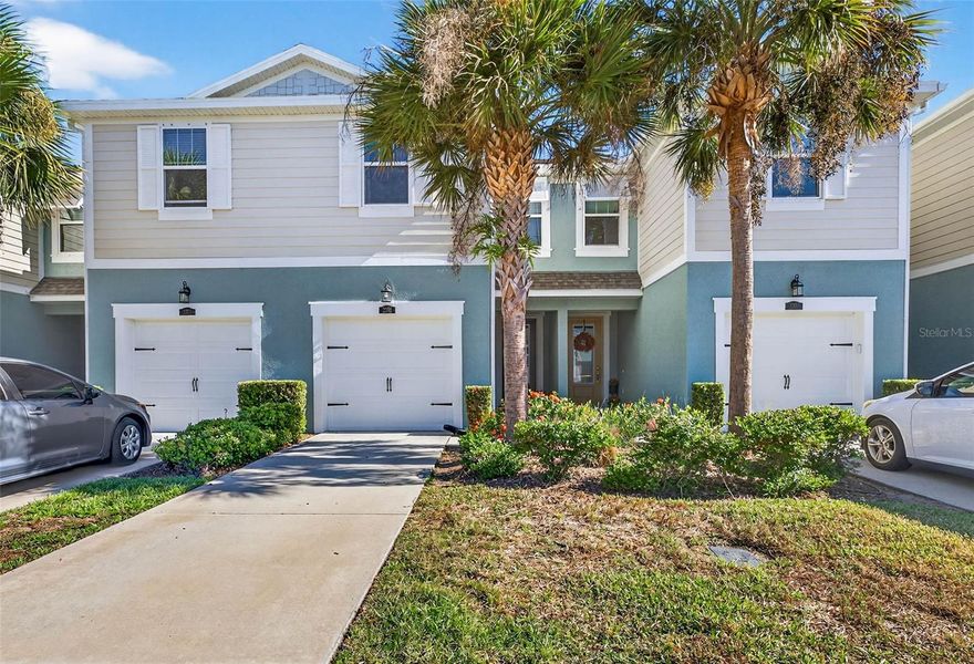 This beautiful 3 bedroom, 2.5 bathroom townhome located in the heart of Oldsmar and is ready for a new owner.  This spacious open concept  has tile throughout the first floor.  The stunning kitchen features white cabinets and granite countertops, a breakfast bar that seats 6 comfortably, pendant lighting, stainless appliances, and large pantry.  The living room has sliders leading into the screened, paved, and covered patio.  Upon entering the second floor, you will be greeted with a large loft area that can be used as an additional living room, library, or whatever your heart desires.  The bedrooms are a split floorpan with the primary bedroom on the left while the remaining bedrooms and full bathroom on the right.  The primary bedroom has 2 walk-in closets.  The primary bathroom has dual sinks and a stand up shower.  There is a laundry closet upstairs making it easy to do laundry.  This unit also has a one car garage.  The community features: a fitness room, pool with cabana, outdoor kitchen with grilling area, community dock, and is gated.  Included in the HOA is exterior paint, roof, lawn care, water, were, and wifi/cable.  Come check out this townhome!