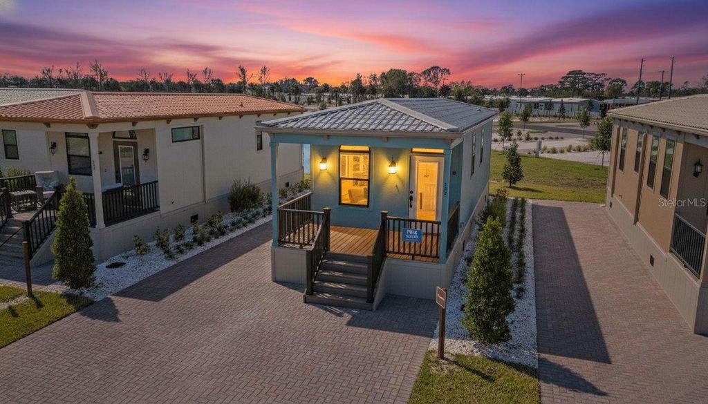 Photo of 6165 Talon Bay Drive #81, North Port, FL 34287 (MLS # TB8470094)