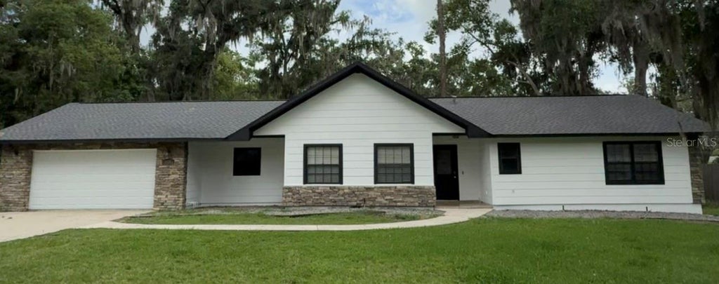 Photo of 645 SE 21st Place, Ocala, FL 34471 (MLS # OM725860)