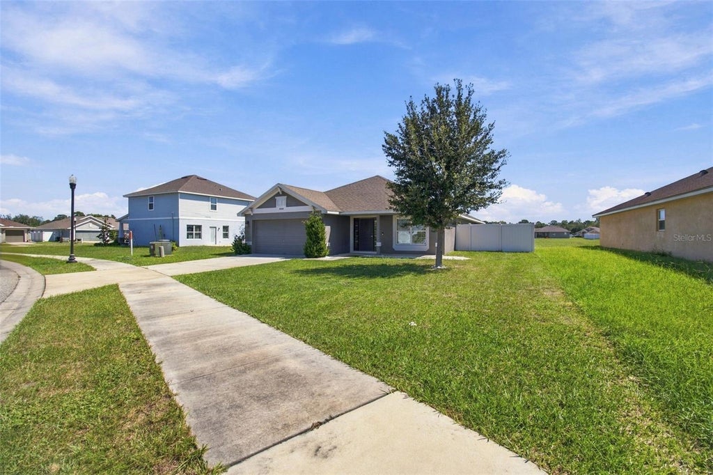 Photo of 16048 Sawgrass Breeze Avenue, Hudson, FL 34667 (MLS # TB8554006)