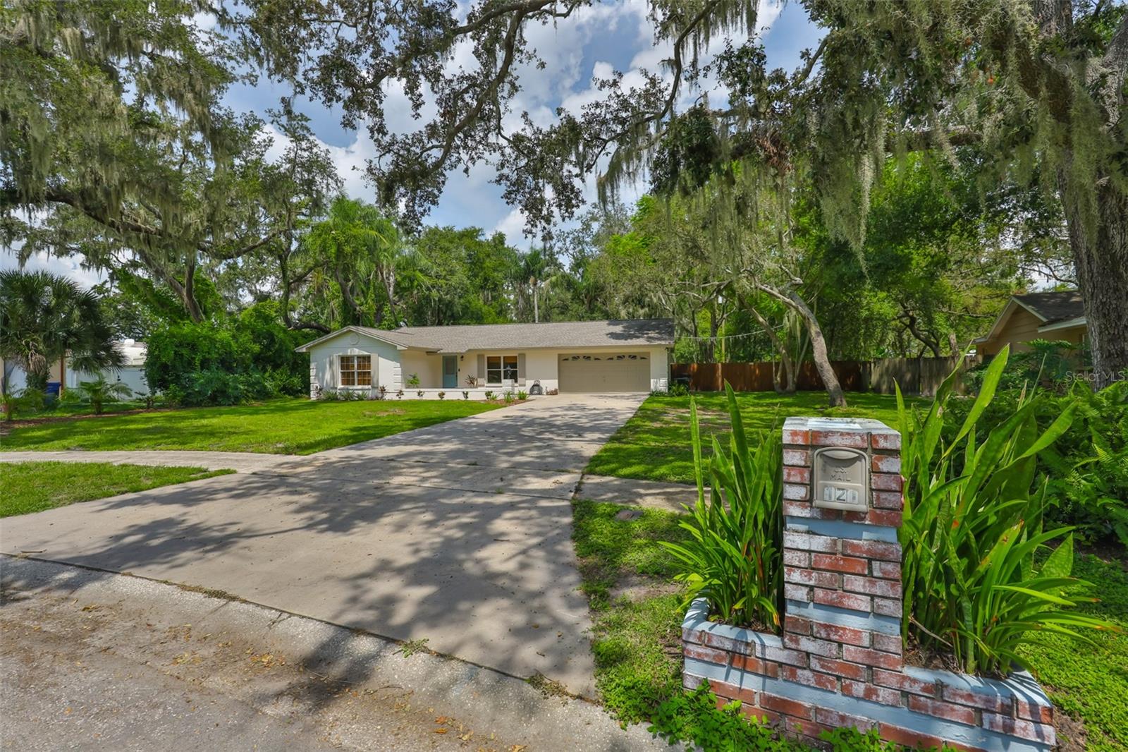Amazing location on a spacious lot, fully fenced. This home features 4 bedrooms, 2 baths, and a 1-car garage (one bedroom was created by converting half of the garage). Upgraded with laminate flooring throughout, ceiling fans, enhanced lighting, and more. Show-stopping kitchen includes newer stainless steel appliances, beautiful stone countertops, and charming shiplap accents throughout.
Both bathrooms have been updated with stylish tile flooring and cabinetry. The laundry room comes equipped with washer and dryer, plenty of cabinets, and built-ins for extra storage. The standout feature is the expansive yard!
Situated in a non-HOA, no-CDD community near shopping, restaurants, hospitals, and more.
