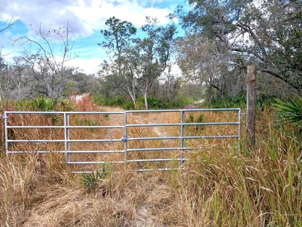 Photo of 701 Gopher Trail, Frostproof, FL 33843 (MLS # K4903239)