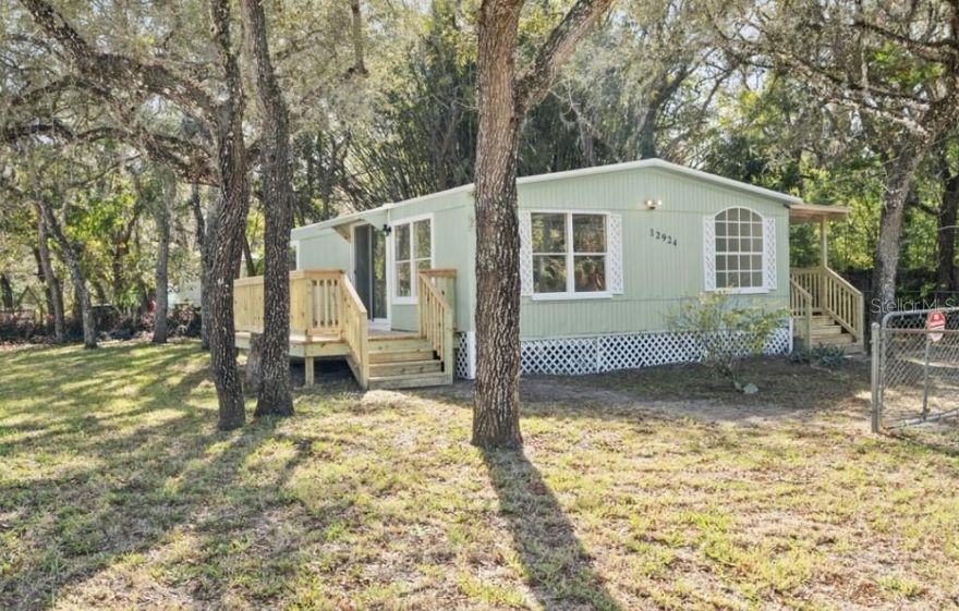 For sale, or possibly rent to own! Newly renovated 2br 2ba mobile home on fenced corner lot! New cabinets, central AC, new decks. Good roof, well, septic. Great layout. washer/dryer hookups inside. New siding on shed. New well pressure tank. New paint. No HOA or restrictions, Moon Lake area. Trailers, boats, RV welcome. Must see!

*Some photos show virtually staged furniture. Renovation is real!

*Rent to own example: $7-15k down payment/option fee pending buyer qualifications. 3 Perc. annual rental increase. 20 year rent to own. Tenant handles maintenance, landlord pays taxes and insurance. Deed transfers to tenant after 20 years.