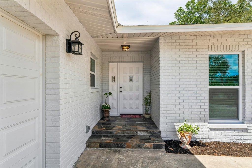 Photo of 1131 Lancer Lane, Tarpon Springs, FL 34689 (MLS # TB8544111)
