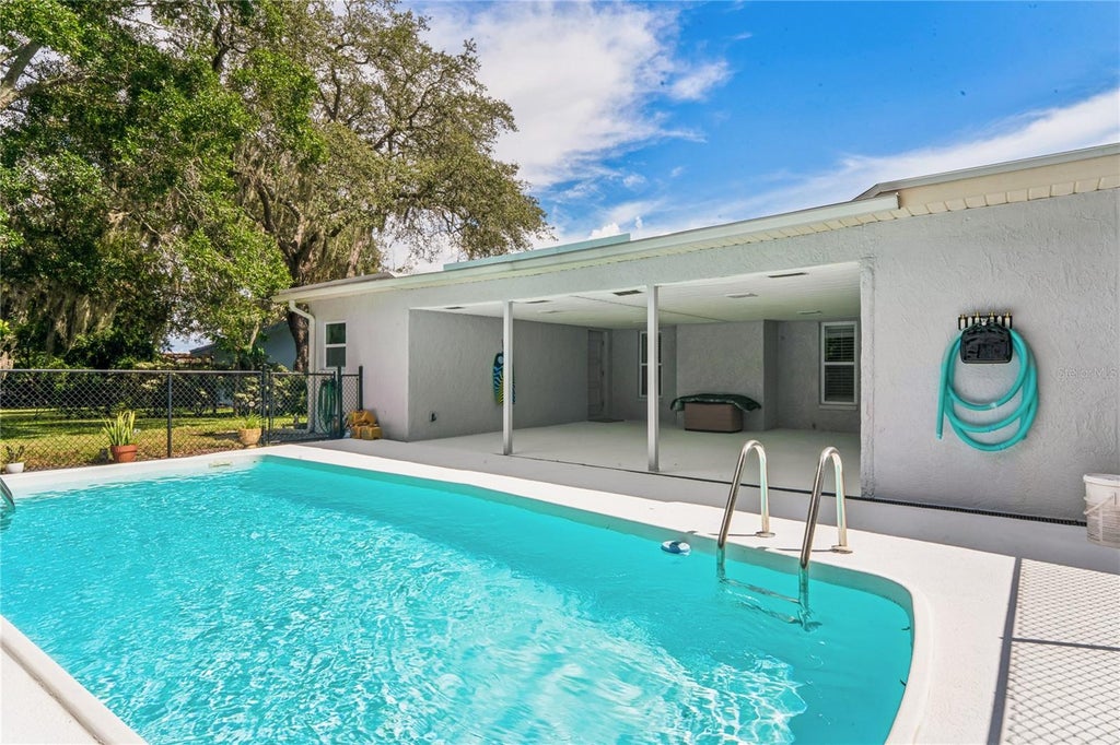Photo of 1131 Lancer Lane, Tarpon Springs, FL 34689 (MLS # TB8544111)