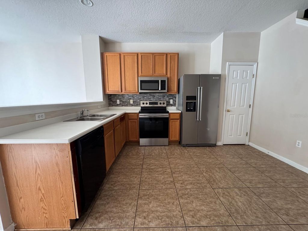 Photo of 5521 Paradise Cay Circle, Kissimmee, FL 34746 (MLS # S5141539)