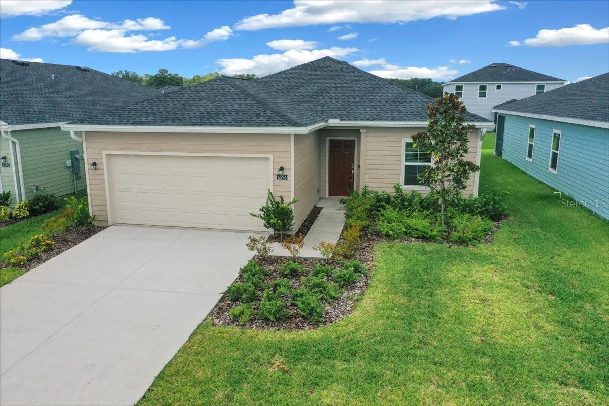 Be the first to live in this NEW construction 2025 home that is pet friendly even for a larger dog! Located in the new Community of Pioneer Ranch in SW Ocala, just a short drive off of SR 200 and only 6 miles from I-75. This home has 1,703 square feet under A/C, with 3 Bedrooms plus a bonus room that can be a den or office, 2 Bathrooms, and a 2 Car Garage. No need to pay for Fiber optic internet service, lawn care, or HOA fees as they are paid for by the Owner and included in the rent. The kitchen features quartz countertops, 42" cabinets, stainless steel appliances, a large island and a walk-in pantry. Plenty of room to entertain your guests in the 16x14 living room. The primary bedroom is located at the back of the home and has a big a walk-in closet. The en-suite bathroom features a large, walk-in tiled shower, and a double vanity with quartz countertops. The laundry room includes the washer and dryer. Enjoy the year round warm Florida weather on the covered, screened in 17x10 back porch lanai. An electronic smart front door lock and a Ring Pro video doorbell add convenience and security. Pioneer Ranch is in the process of constructing great amenities for all residents to enjoy, estimated to be completed approximately in March 2026. Upcoming luxury amenities will include: resort style pool with cabanas, expansive community clubhouse, fitness center, pickleball courts, dog park, and a playground. Centrally located just a short drive to schools, restaurants, shopping, medical facilities and still only 10 miles away from the famous World Equestrian Center. First month's rent and security deposit required for move in. Don't miss your chance to live in this amazing new home, schedule your showing today.