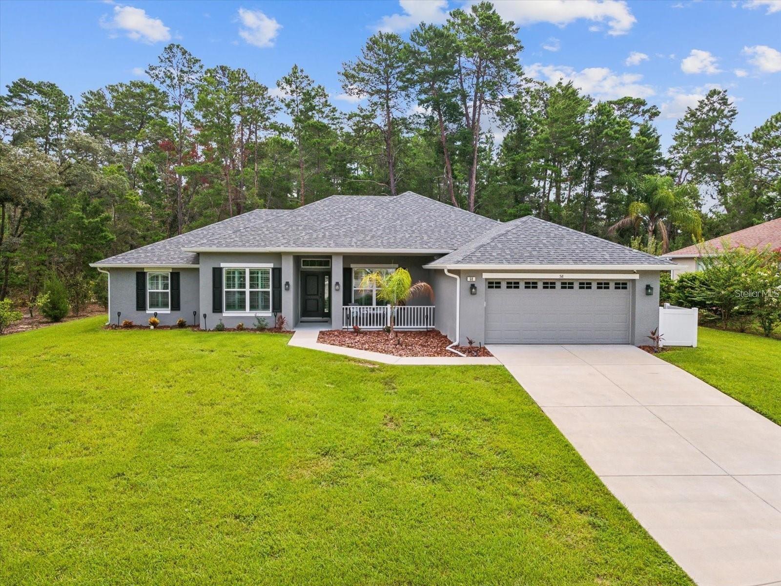 Short Sale. This is an Adams Home with construction defects. Come see this immaculate 4-bedroom, 2-bathroom home in Oak Village of Sugar Mill Woods. Priced to sell, this home offers a perfect blend of modern upgrades, spacious living areas, and a serene outdoor environment. Notable features include a modern open and split floor plan, a luxurious primary bedroom with an ensuite, newer flooring, cabinets, fixtures, paint, water-softener and plantation shutters throughout the home. The outdoor amenities feature a screened-in porch, a privacy PVC fence, epoxy garage floors, sprinkler system, and a newer roof with a transferable warranty. Located conveniently near attractions, shopping, and beaches in Homosassa. Washer dryer, stove, refrigerator, dishwasher and microwave not included. This home presents an excellent opportunity for buyers seeking comfort and style. Schedule a showing today to see this desirable property!