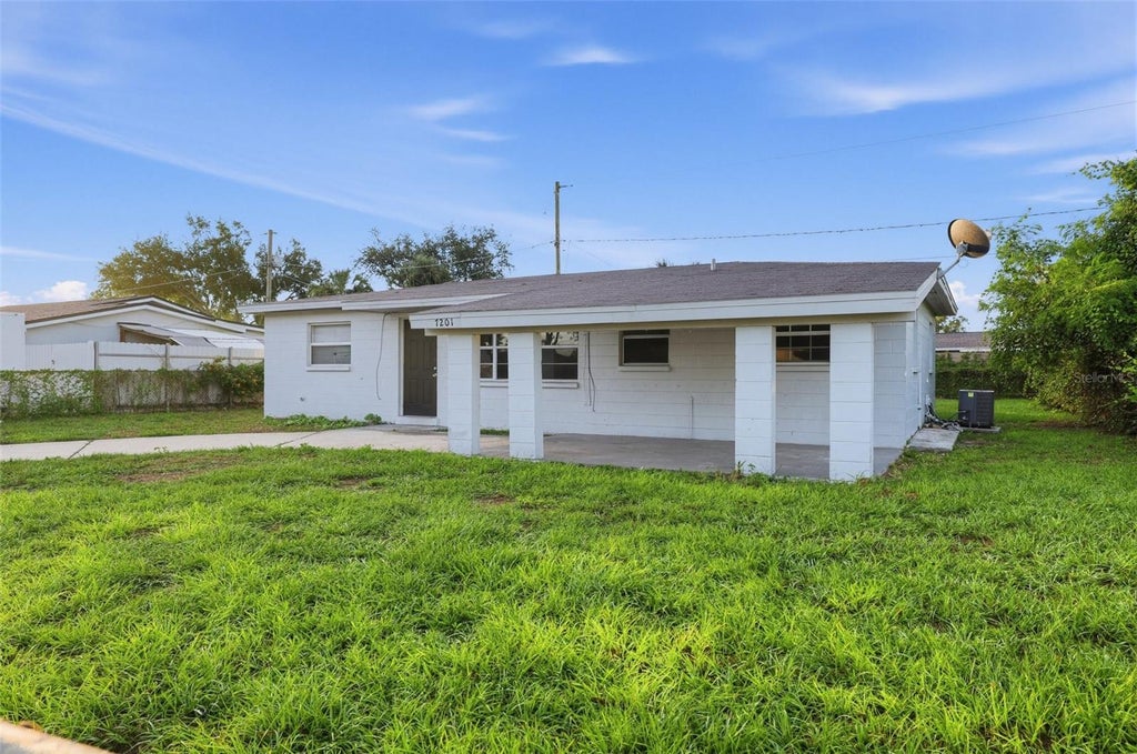 Photo of 7201 Kingston Drive, Tampa, FL 33619 (MLS # O6452802)