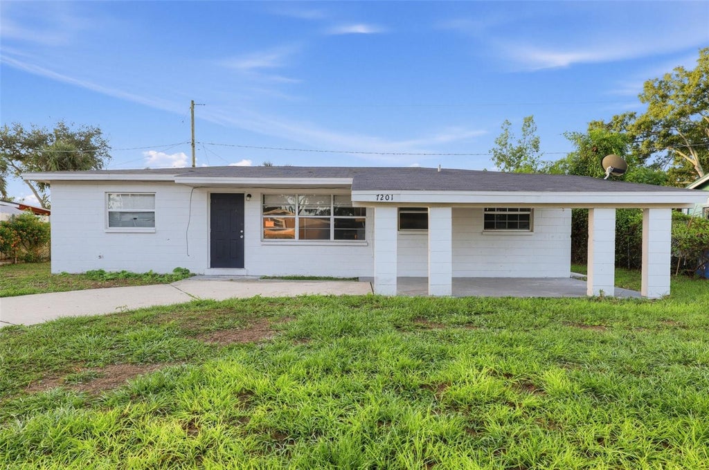 Photo of 7201 Kingston Drive, Tampa, FL 33619 (MLS # O6452802)