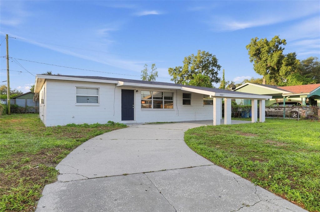 Photo of 7201 Kingston Drive, Tampa, FL 33619 (MLS # O6452802)