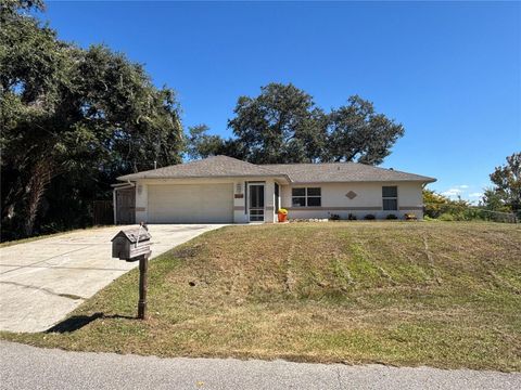 Photo of 1114 S Narramore Street, North Port, FL 34287 (MLS # N6141067) Photo of 1114 S Narramore Street, North Port, FL 34287 (MLS # N6141067)
