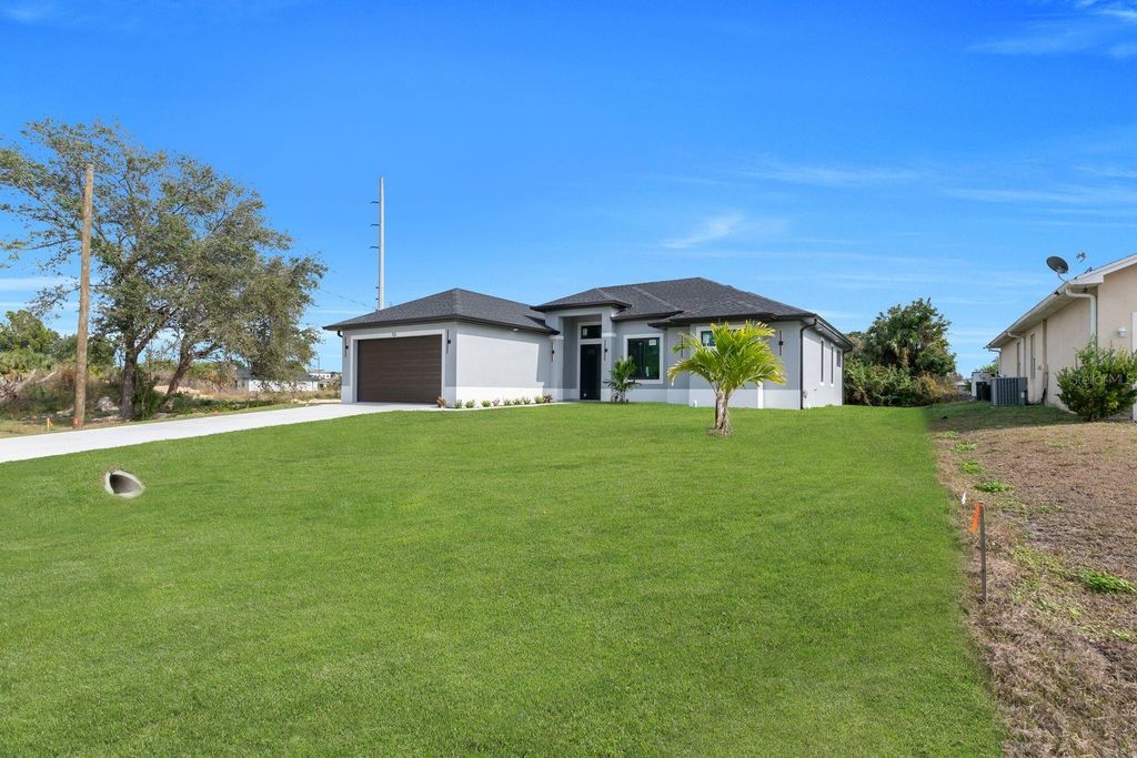 Photo of 53 Susan Avenue S, Lehigh Acres, FL 33976 (MLS # A4678368)