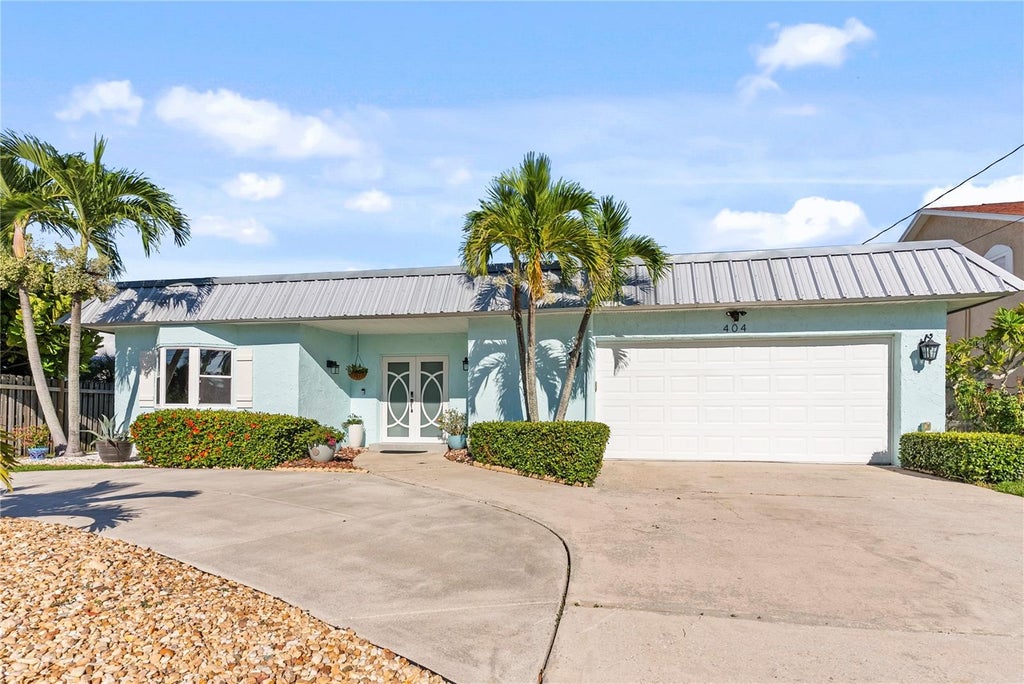 Photo of 404 Harbor Drive S, Indian Rocks Beach, FL 33785 (MLS # TB8553795)