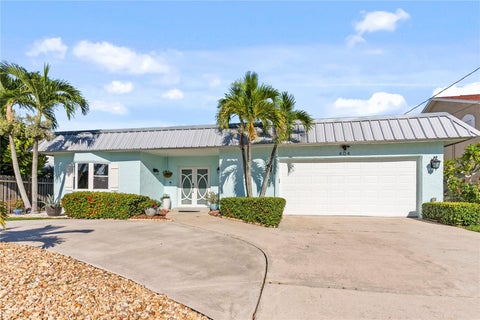 Photo of 404 Harbor Drive S, Indian Rocks Beach, FL 33785 (MLS # TB8553795)