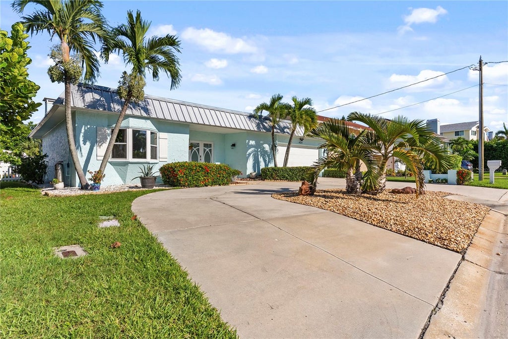 Photo of 404 Harbor Drive S, Indian Rocks Beach, FL 33785 (MLS # TB8553795)