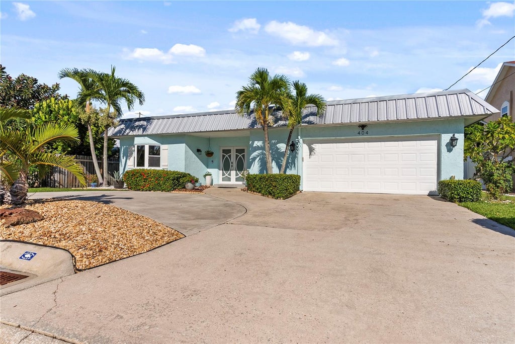 Photo of 404 Harbor Drive S, Indian Rocks Beach, FL 33785 (MLS # TB8553795)
