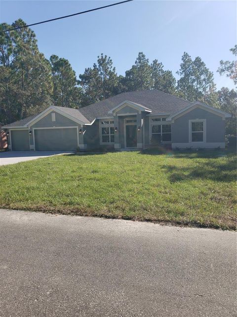 Photo of 12310 Indigo Bunting Road, Weeki Wachee, FL 34614 (MLS # OM701493) Photo of 12310 Indigo Bunting Road, Weeki Wachee, FL 34614 (MLS # OM701493)