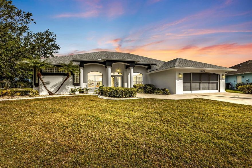 Freshly painted and move in ready! Imagine coming home to relax in your spa-like retreat.  A grand entrance leads you to stunning views of the pool & hot tub with a cascading waterfall.  This custom built home not only has a spacious living room w/10 ft. ceilings but also an 18x18 family room (pool table included)!  The dream kitchen has Corian countertops with a peninsula w/bar seating and a center island.  Loads of storage space and modern appliances.  In addition to the breakfast nook with a view of the pool, you have a formal dining area.  Plenty of space for entertaining!  The split bedroom floorplan has the 2nd and 3rd bedrooms on one side and the primary w/en-suite bath on the other.  Double walk-in closets, walk-in shower, soaking tub and a double sink vanity offers a relaxing place to unwind.  This home also has a dedicated office w/a French door for privacy.  The living room opens to the huge lanai w/caged heated pool and tropical landscaping.  There is also a separate sun area for lounging or to barbeque.  This home sits on an oversized lot (.34 acre).  New roof in 2023, new pool cage rescreen, exterior paint and landscaping in 2024.  NO FLOOD ZONE!! Located in Deep Creek.
