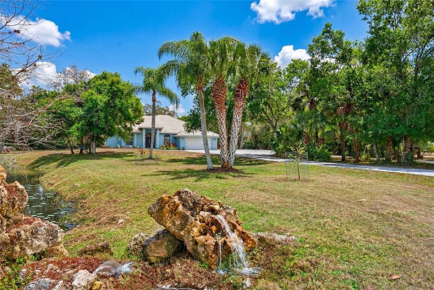 Country tranquility meets Sarasota convenience on this PRIVATE 5-ACRE estate tucked away at the end of a QUIET CUL-DE-SAC in the POPULAR GATED EQUESTRIAN COMMUNITY of Saddle Creek! This 4 BED + DEN/OFFICE, 3 BATH home with 2,510 square feet underwent a large renovation by Trinity Construction in 2018 (NEW KITCHEN, NEW FLOORING, NEW BATHROOMS, NEW PAINT, NEW LIGHTING & MORE). Inside, WOOD-LOOK PLANK TILE flows throughout the entire home, complemented by a WOOD BURNING FIREPLACE, 7 SLIDING GLASS DOORS OUT TO YOUR LANAI, and a TRAY CEILING in the spacious primary suite. The open farmhouse kitchen is both stylish and functional, featuring QUARTZ countertops, white RAISED PANEL CABINETRY, STAINLESS STEEL APPLIANCES, a WALK-IN PANTRY, and a generous 6 PERSON BREAKFAST BAR that creates a natural gathering space for family and guests. The primary suite serves as a relaxing retreat with a CUSTOM WALK-IN CLOSET and a SPA-INSPIRED BATHROOM showcasing DUAL VANITIES, a SOAKING TUB, a GLASS ENCLOSED SHOWER with beautiful tile work, and multiple shampoo niches for added convenience. Step outside to enjoy true Florida living with a HEATED POOL & SPA surrounded by a screened lanai, offering multiple areas for entertaining, dining, or simply relaxing while overlooking your private acreage. For those seeking a true equestrian or hobby farm lifestyle, the property is GATED, FULLY FENCED & CROSS-FENCED AND READY FOR HORSES, ANIMALS and TOYS! A well-equipped barn includes: TWO ~16x13 HORSE STALLS W/ WATER (room for 2 more), a 35x11 breezeway, THREE AIR CONDITIONED ROOMS (currently being used as a tack room/gym, music room & storage/workshop), and covered storage for lawn equipment and more. The grounds also feature THREE SEPARATELY FENCED/GATED PASTURES, STOCKED POND, 15x9 CHICKEN COOP, FRUIT TREES, REVERSE OSMOSIS SYSTEM, and even an RV HOOKUP, providing endless opportunities for recreation and self-sufficiency. The MATURE TREES create an unforgettable ambiance as you watch the SUNSETS outside your front door! The home was RE-PIPED in 2020 and the A/C was replaced in 2021! Saddle Creek is known for its horse-friendly environment and over 25 MILES OF RIDING TRAILS winding throughout the approximately 1,000-acre community of just 161 homes. Despite the PEACEFUL RURAL ATMOSPHERE, you are only 7 miles to Publix, 5 miles from I-75, 13 miles from Siesta Key Beach, about 15 miles from Downtown Sarasota and the UTC Mall, offering easy access to world-class beaches, dining, shopping, and cultural attractions. Set within the A-RATED RIVERVIEW HIGH, SARASOTA MIDDLE & LAKEVIEW ELEMENTARY SCHOOL DISTRICT! If you’ve been searching for the perfect balance of privacy, acreage, equestrian lifestyle, and proximity to Sarasota’s best amenities, this remarkable Saddle Creek property offers country living at its finest!