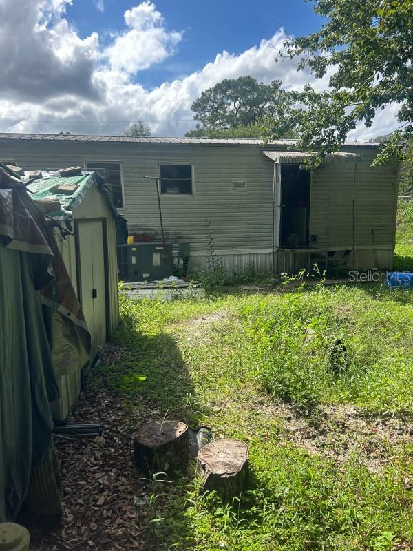 This 3-bedroom, 2-bath double wide mobile home sits on its own lot of 7,841 sq and offers 960 sq ft of living space. Built in 1985, it features a solid roof and a brand-new HVAC system. The kitchen and bathrooms are original, and the flooring is carpet, giving you the perfect opportunity to update to your style. The property is fully fenced with chain link, has a shed in the backyard, and runs on well and septic. No plumbing issues reported.