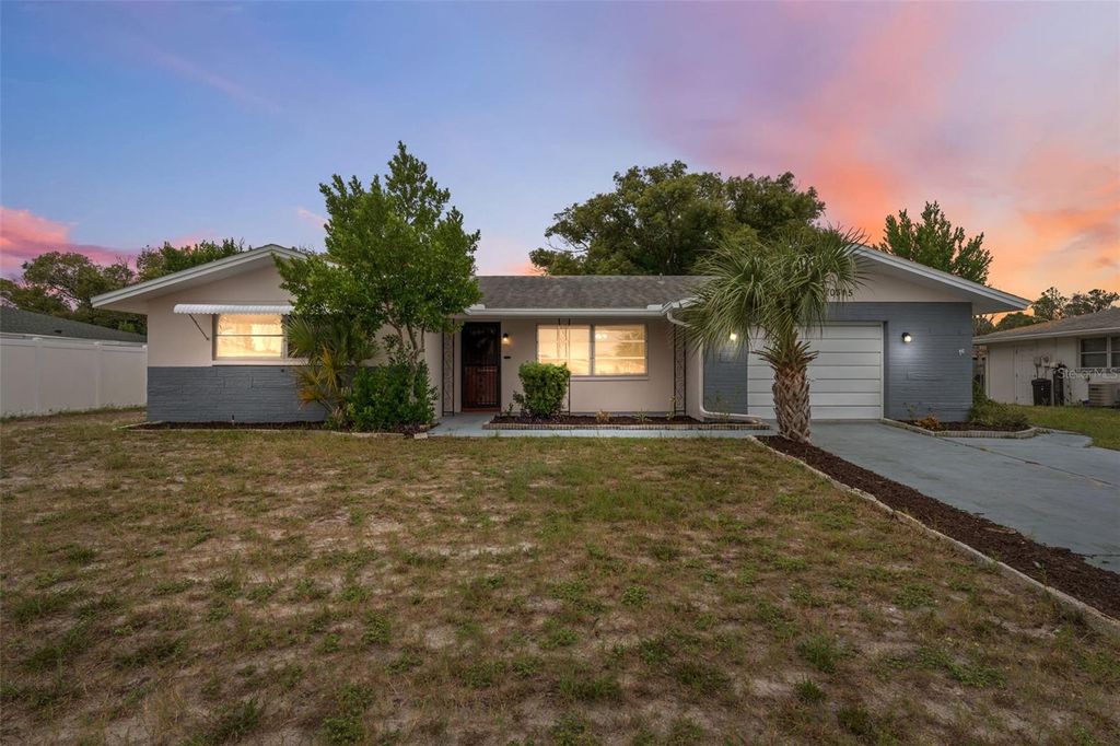 Photo of 10315 Pastel Lane, Port Richey, FL 34668 (MLS # TB8437136)