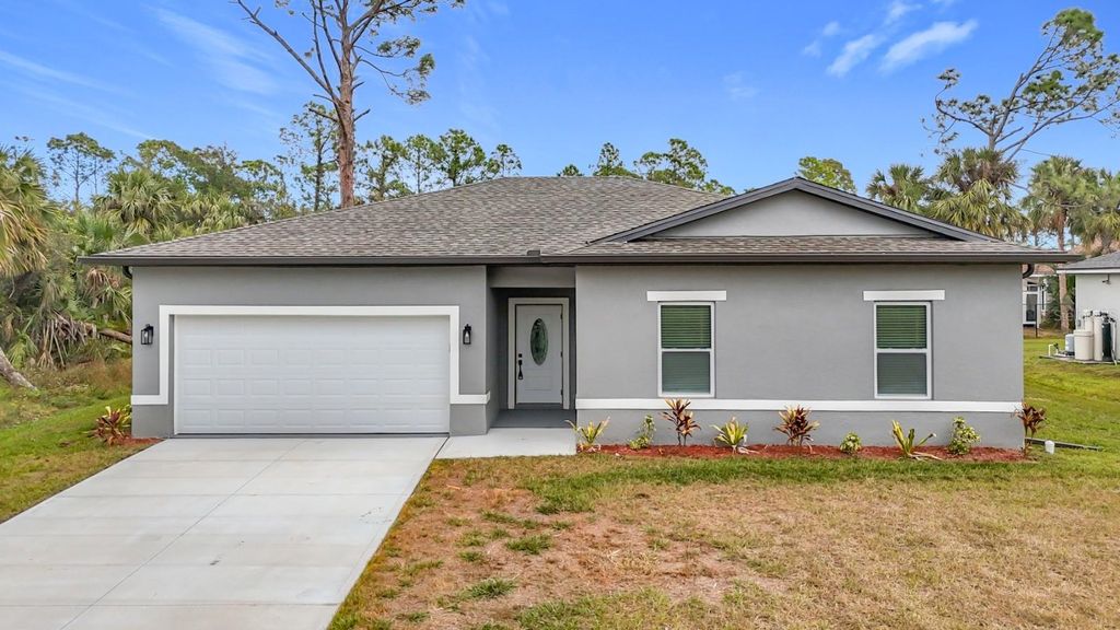 Photo of 23371 Harold Avenue, Port Charlotte, FL 33980 (MLS # O6379604)
