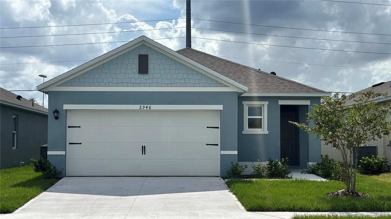 Welcome to your brand-new dream home in Lake Deer Estates, a vibrant new community in Poinciana, Florida! This beautifully designed one-story 3-bedroom, 2-bathroom home offers the perfect blend of style, functionality, and comfort for modern living.
Step inside to a bright open-concept layout, where the kitchen, living, and dining areas flow seamlessly, perfect for everyday living and entertaining. The kitchen features granite countertops, stainless steel appliances, a walk-in pantry, and stylish finishes that make both cooking and hosting a delight.
Enjoy your morning coffee or unwind in the evenings on the covered lanai overlooking the backyard, ideal for outdoor relaxation.
Each bedroom includes carpeted floors and generous closet space, offering flexibility whether used as bedrooms, office space, or guest rooms. The primary suite, tucked away at the rear of the home, boasts a private bath with double vanity and a spacious walk-in closet.
Additional features include:
- Smart Home Technology: Control your home remotely with your smart device.
- Prime Location: Just minutes from Poinciana Community Park.
- Showing 7 Days a Week!
- A one-time $75 administrative fee will be charged at move-in.
Don't miss this opportunity to make a brand-new home yours. Schedule your tour today!
