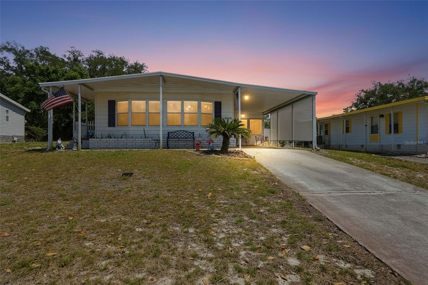 Freshly painted exterior, elevated positioning well above road grade, and ample parking with a one-car carport and an extended driveway. No Flood zone (x), no CDD and a very low HOA ($55 a month) with a lot of amenities!  Welcome to 15080 Rialto Ave located in 55+ golf community of Brookridge where you own your own land! 
Step inside into the kitchen featuring solid wood cabinetry with 12 cabinets, a pantry for added storage, and all major appliances including refrigerator, stove, and dishwasher. An eat-in countertop opens to the living room, creating the perfect space to enjoy your morning coffee while staying connected to the main living area.
Just off the kitchen, the dining room showcases a charming built-in cabinet with a mix of traditional and glass-front storage—ideal for a coffee bar, display space, or entertaining essentials. The home flows into the living room, where luxury vinyl plank flooring extends throughout the main living areas, offering both durability and modern appeal.
Down the hallway, you’ll find a guest bathroom complete with a tub/shower combination. The secondary bedroom, located at the end of the hall, features a walk-in closet and cozy carpet. The spacious primary suite offers its own private retreat with an en suite bathroom, designed with a separate sink area apart from the tub/shower, and toilet for added convenience. Sliding glass doors lead directly from the primary bedroom to a relaxing enclosed porch.
The enclosed porch provides additional versatile living space and connects to the garage, making it perfect for indoor-outdoor living. Just outside, unwind in your private Jacuzzi—available as a negotiable feature for buyers if you want it! FULLY FENCED YARD!
Additional upgrades include all new FLOORING, a brand-new AC SYSTEM, and a NEW VAPOR BARRIER for peace of mind. The home is outfitted with faux wood blinds and curtains throughout, adding both style and privacy. A storage shed is also included, offering extra space for tools and equipment.

Located in a 55+ community with 24/7 security guard as well as gated around the entire neighborhood. 18-hole par 72 Golf Course, tennis, shuffleboard, pickleball,  putting green, horseshoes, bocce court, heated community pool, Sauna, community club house, fitness center, shuffleboard, picnic areas, and so many more activities for you to enjoy INSIDE the community! Outside the community it is close to banks, shopping, dining, hospitals, doctor offices, Suncoast Parkway, natural springs and rivers and marinas, Weeki Wachee Springs, Pine Island Beach, Public Boat Ramps that go out to the Gulf of Mexico, Spring Hill, Public Golf Courses, Public Parks, Hiking trails, biking trails, and the outlet malls are only 45 minutes away! Bring your golf cart and start living the Florida Life today!
