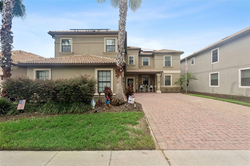 Photo of 1319 Gleneagles Lane, Davenport, FL 33896 (MLS # O6439171)
