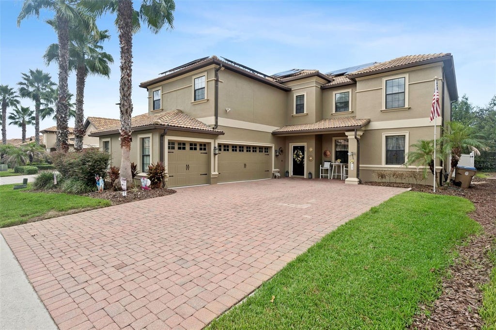 Photo of 1319 Gleneagles Lane, Davenport, FL 33896 (MLS # O6439171)